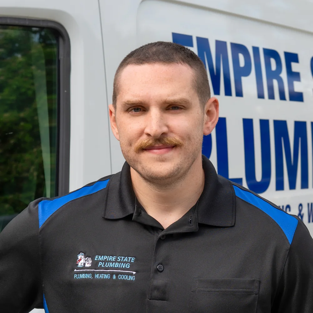Empire State Plumbing service technician at the company's Nassau, NY shop